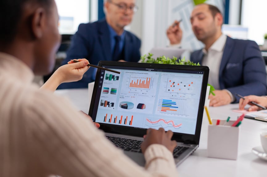 multi-ethnic-business-team-sitting-table-office-center-speaking-about-project-meeting-broadroom