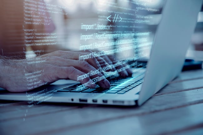 programming-background-with-person-working-with-codes-computer-1