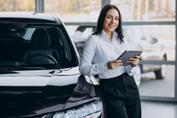 saleswoman-car-showroom-selling-cars