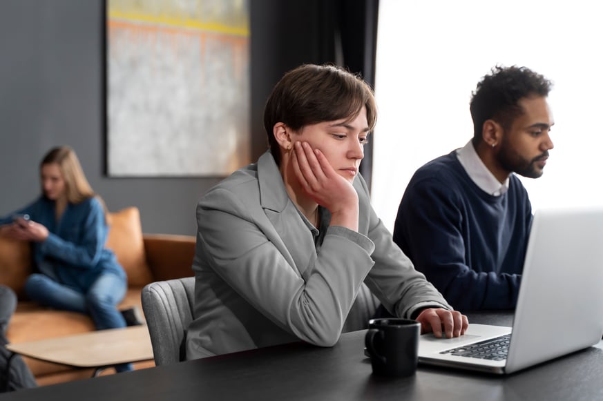 trans-person-working-office-with-colleagues